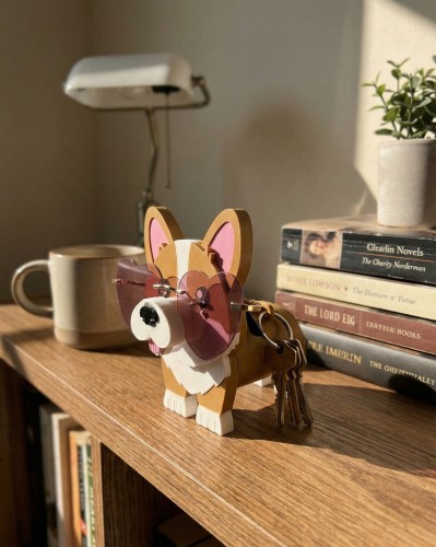nightjar_image_Photorealistic_close-up_of_an_endearing_3D_printed_corgi_figure__exquisitely_cra.jpeg